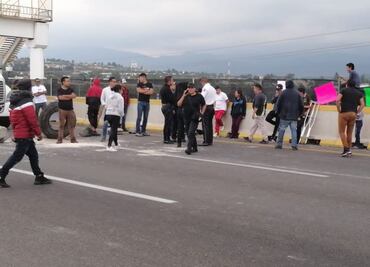 Autopista México-Puebla con bloqueos por protesta de ejidatarios de Tlahuapan