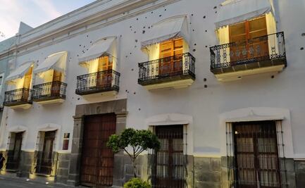 Qué hay en la casa con balazos que está en la Calle de los Dulces