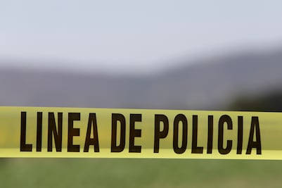 Localizan cadáver con masa encefálica expuesta en la carretera a Calpan