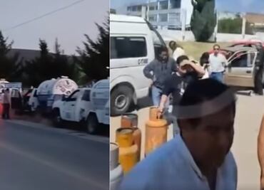 Usuarios realizan largas filas junto con sus cilindros en Puebla, señalan desabasto de combustible