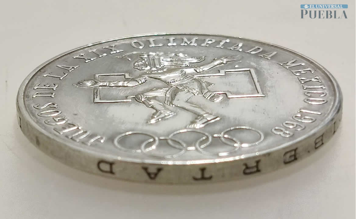 La moneda de las Olimpiadas fue acuñada en plata. Foto: Demian Magallán/ EL UNIVERSAL PUEBLA