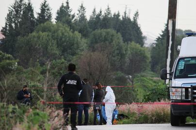 Hallan cadáver dentro de una maleta en la intersección del Periférico y la México-Puebla