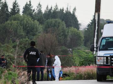 Hallan cadáver dentro de una maleta en la intersección del Periférico y la México-Puebla
