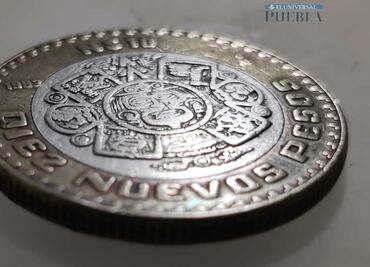 Cuáles son las monedas de 10 pesos que tienen centro de plata