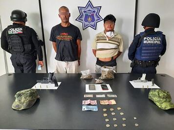 Agarran a dos empistolados y con droga en Atlixco