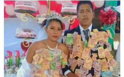 Por qué a los novios les cuelgan billetes en su boda
