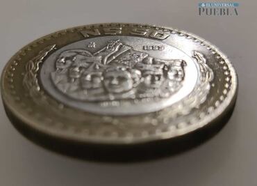 Cuánto vale actualmente la moneda de 50 Nuevos Pesos con centro de plata