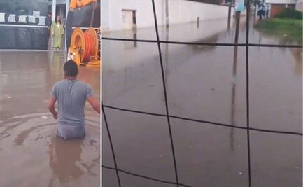 VIDEO Niños quedan atrapados en primaria por inundación en Coronango