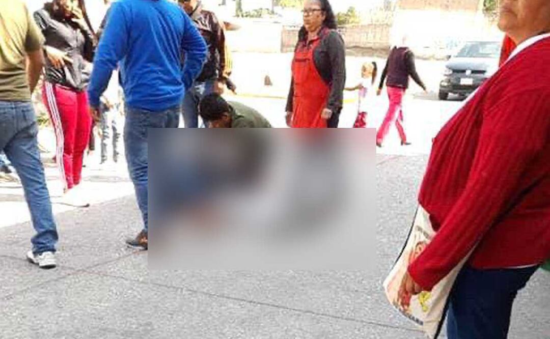 A las afueras de una primaria en la junta auxiliar Santa Catarina Hueyatzacoalco un hombre fue baleado y asaltado | Foto: Especial