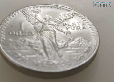 Cuánto vale una onza 'gordita', la moneda de plata con el diseño del Centenario