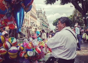 Globeros en Puebla, la historia de un oficio que agoniza