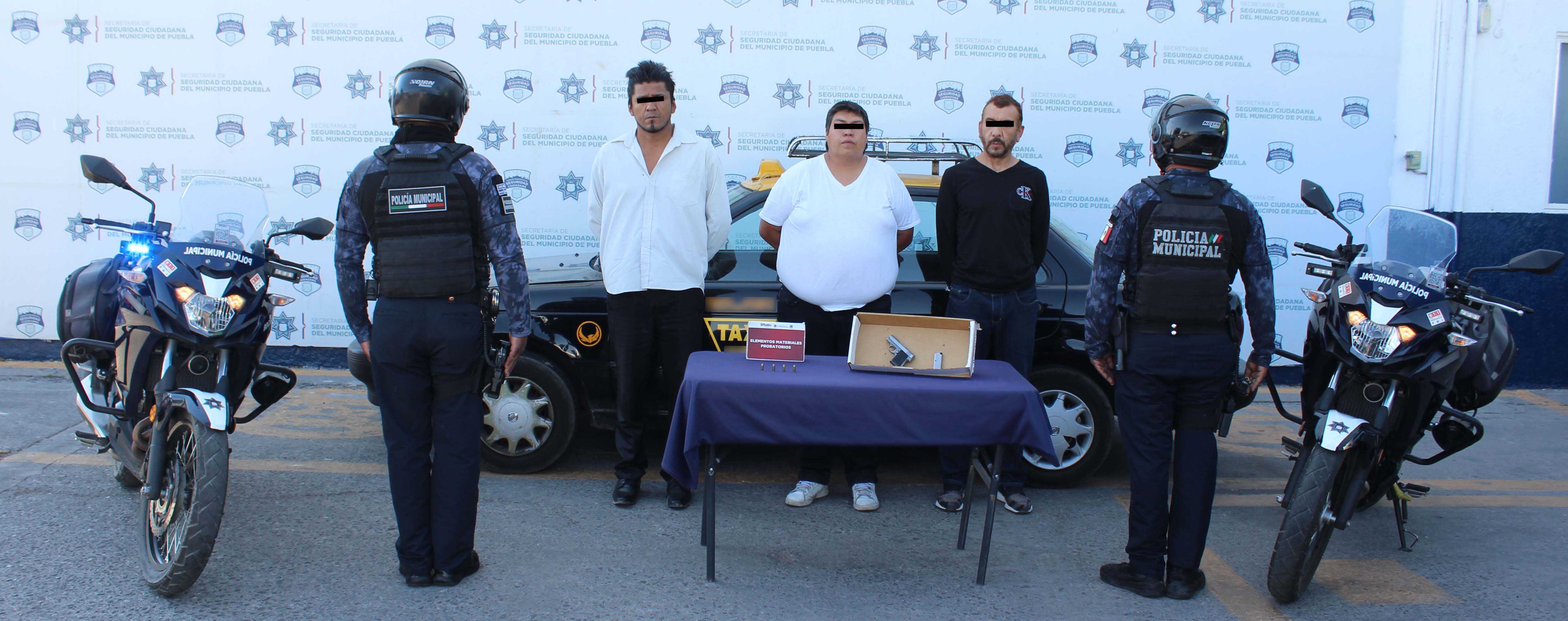 A los tres hombres se les encontró en posesión de un arma de fuego y cartuchos  Imagen: Secretaría de Seguridad Ciudadana