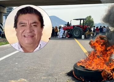 Bloqueo y quema de llantas en la autopista Siglo XXI por resultados electorales