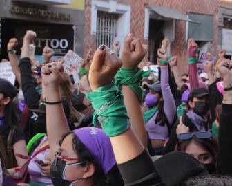 Cuáles son los símbolos y las consignas del 8M