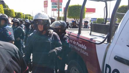 Balacera en el mercado Hidalgo. Se agarran polis y ambulantes