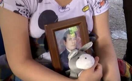 Con foto de su papá muerto por Covid, niña de 9 años acude a vacunarse