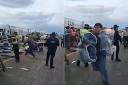VIDEO Tráiler con jeans se vuelca en carretera México-Tulancingo y desata rapiña